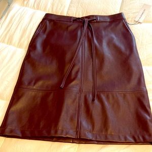 Brand new, burgundy/wine color faux leather Aa-line skirt.